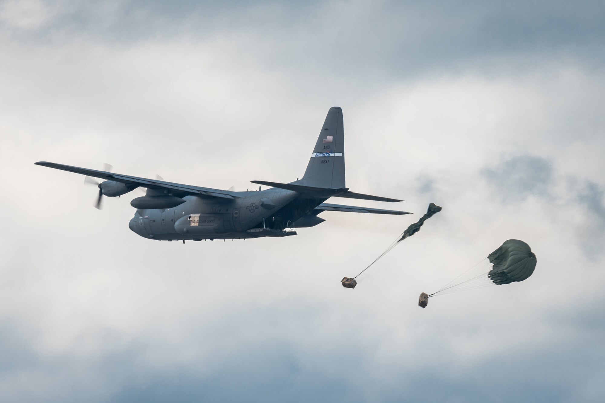 A C-130 Hercules aircraft from the Kentucky Air National Guard’s 123rd Airlift Wing air-drops two bundles of cargo in the Ohio River during the Thunder Over Louisville air show in Louisville, Ky., April 22, 2017. The annual event has grown to become the largest single-day air show in the nation. (U.S. Air National Guard photo by Lt. Col. Dale Greer)