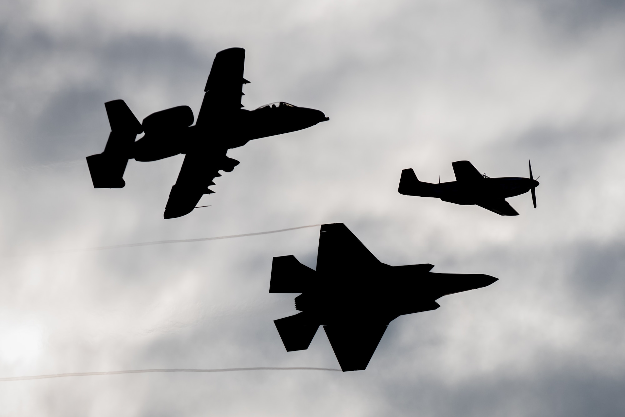 In honor of the U.S. Air Force 70th Anniversary, a trio of historic and modern aircraft fly an aerial demonstration over the Ohio River during the Thunder Over Louisville air show in Louisville, Ky., April 22, 2017. The group is comprised of (from left to right) a U.S. Air Force A-10 Thunderbolt II close air support aircraft, a U.S. Air Force F-35 Lightning II fighter and a P-51 Mustang fighter-bomber. The F-35, from Luke Air Force Base, Ariz., is the Air Force’s newest fighter aircraft. (U.S. Air National Guard photo by Lt. Col. Dale Greer)