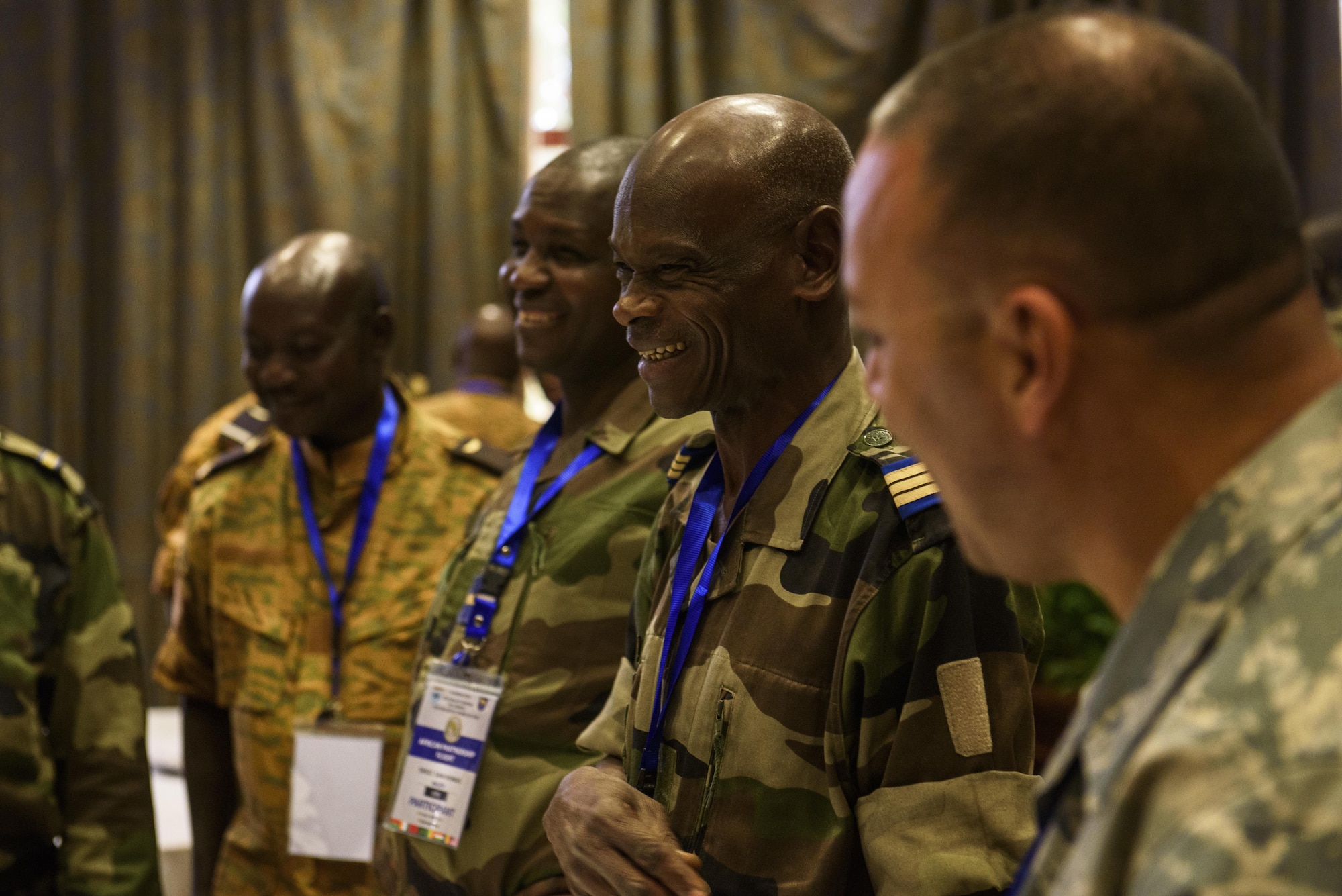 African Partnership Flight participants take a short break in between class discussions in Ouagadougou, Burkina Faso, April 18, 2017. APF in Burkina Faso hosted participants from Chad, Mali, Mauritania, Niger, Cote d’Ivoire and Morocco to help strengthen relationships and share best practices. (U.S. Air Force photo by Staff Sgt. Jonathan Snyder)