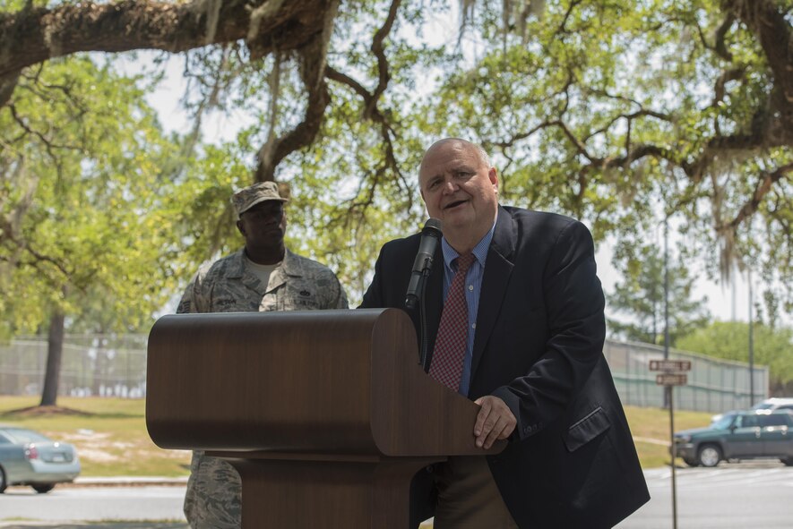 Donald Davis, Lowndes County Historical Museum executive director, talks about the partnership and legacy of the Team Moody and local communities’ bond during “Flying Tiger Oak’s” induction ceremony into the Live Oak Society, April 28, 2017, at Moody Air Force Base, Ga. This tree is one of approximately 8,300 nationally registered live oaks across 14 states, known for its prestigious tradition, location and size. Dr. Lucy Greene, Moody Support Committee executive director, reached out to community leaders about getting the tree recognized, which was accepted for its significance of pre-dating Moody AFB and being symbolic of the communities’ bond. 