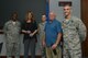 Leadership from the 20th Fighter Wing recognize the 20th Medical Support Squadron medical readiness flight as the Shaw “Weasels of the Week” at Shaw Air Force Base, S.C., May 3, 2017. The medical readiness flight oversees emergency management functions, deploys medical employees and equipment, and prepares the 20th Medical Group to provide casualty care. (U.S. Air Force photo by Airman 1st Class Destinee Sweeney)