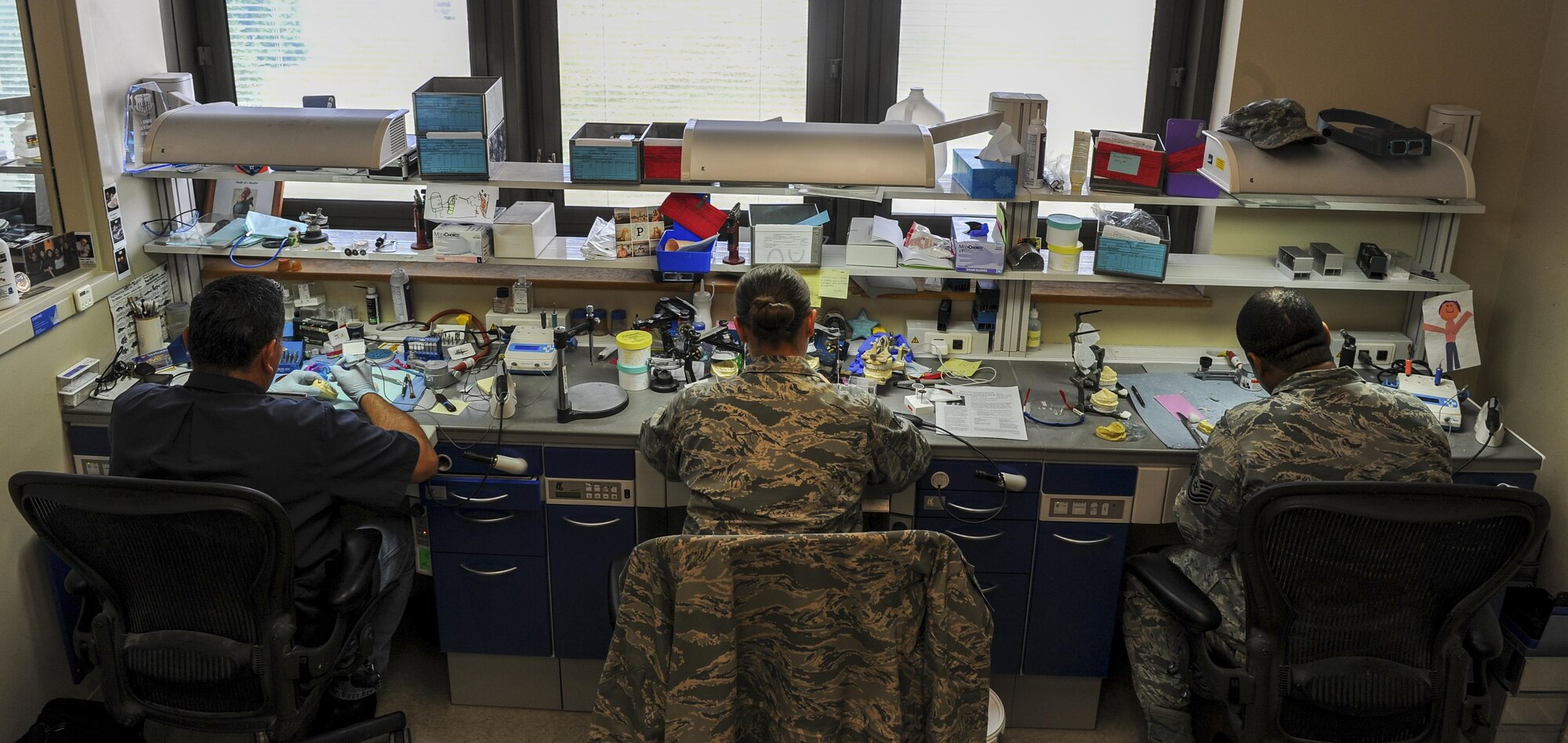Dental laboratory technicians with the 1st Special Operations Dental Squadron work in the dental lab at Hurlburt Field, Fla., May 2, 2017. The dental laboratory fabricates crowns, bridges, implants, night guards and sports guards. The six-man shop completes approximately 1,000 active cases a year. (U.S. Air Force photo by Airman 1st Class Isaac O. Guest IV)