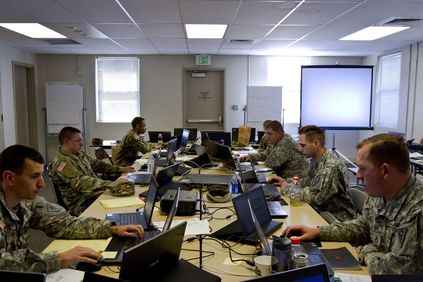 A group of U.S. Army Reserve and National Guard cyber Soldiers work together to defend their network during Cyber Shield 17 at Camp Williams, Utah, May 2, 2017. Cyber Shield is a National Guard exercise, in cooperation with U.S. Army Reserve, that provides Soldiers, Airmen and civilians from over 44 states and territories the opportunity to test their skills in response to cyber-incidents in a multi-service environment. 