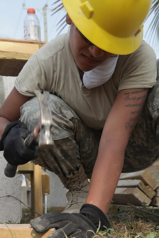 U.S. Army Sgt. Fatima Nevels, with the 372nd Engineer Company, builds concrete molds at St. Matthew's School construction site during Beyond the Horizon 2017, St. Matthew's Belize, May 1, 2017. Beyond the Horizon is a U.S. Southern Command-sponsored, Army South-led exercise designed to provide humanitarian and engineering services to communities in need, demonstrating U.S. support for Belize. (U.S. Army photo by Spc. Gary Silverman)