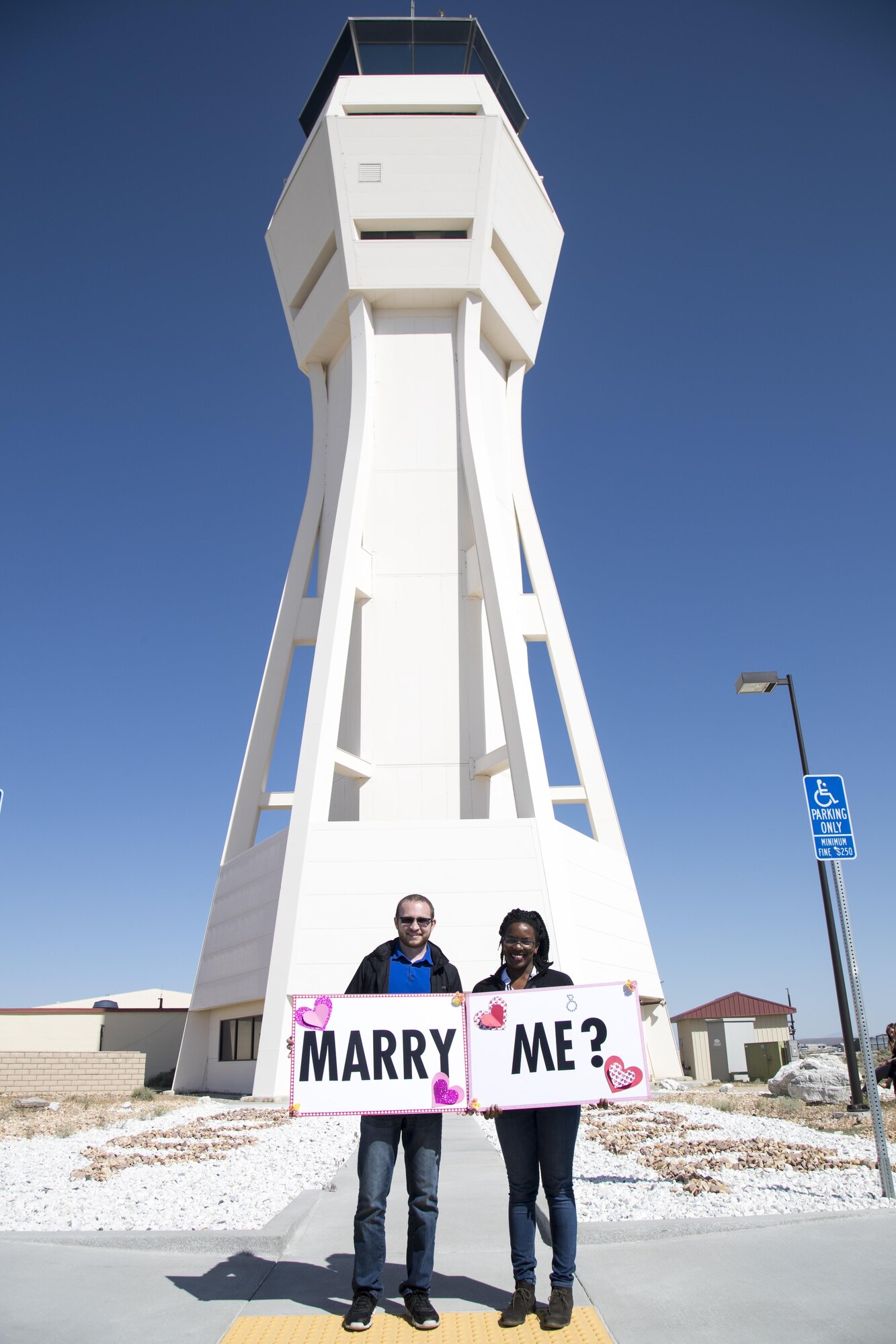 Daniel Ciolkosz, 775th Test Squadron, and Amarachi Egbuziem, 772nd Test Squadron, got engaged at the Edwards control tower April 19. (U.S. Air Force photo by Christian Turner)