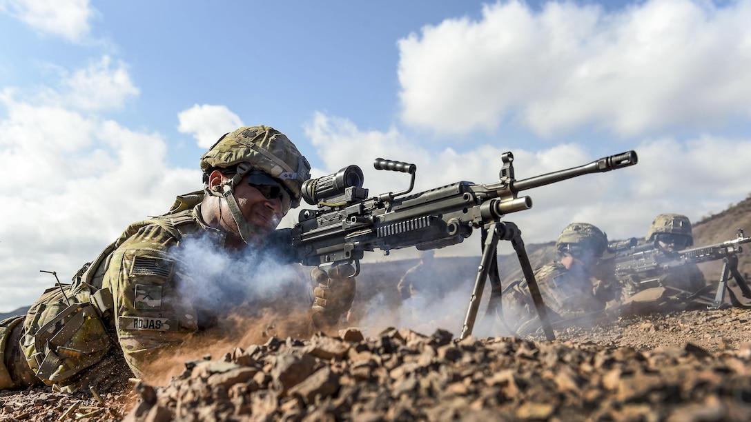 Army Pvt. Michael Rojas fires an M249 light machine gun during small arms training in Arta, Djibouti, May 2, 2017. Rojas is assigned to Combined Joint Task Force Horn of Africa's East African Response Force. Air Force photo by Staff Sgt. Nicholas M. Byers