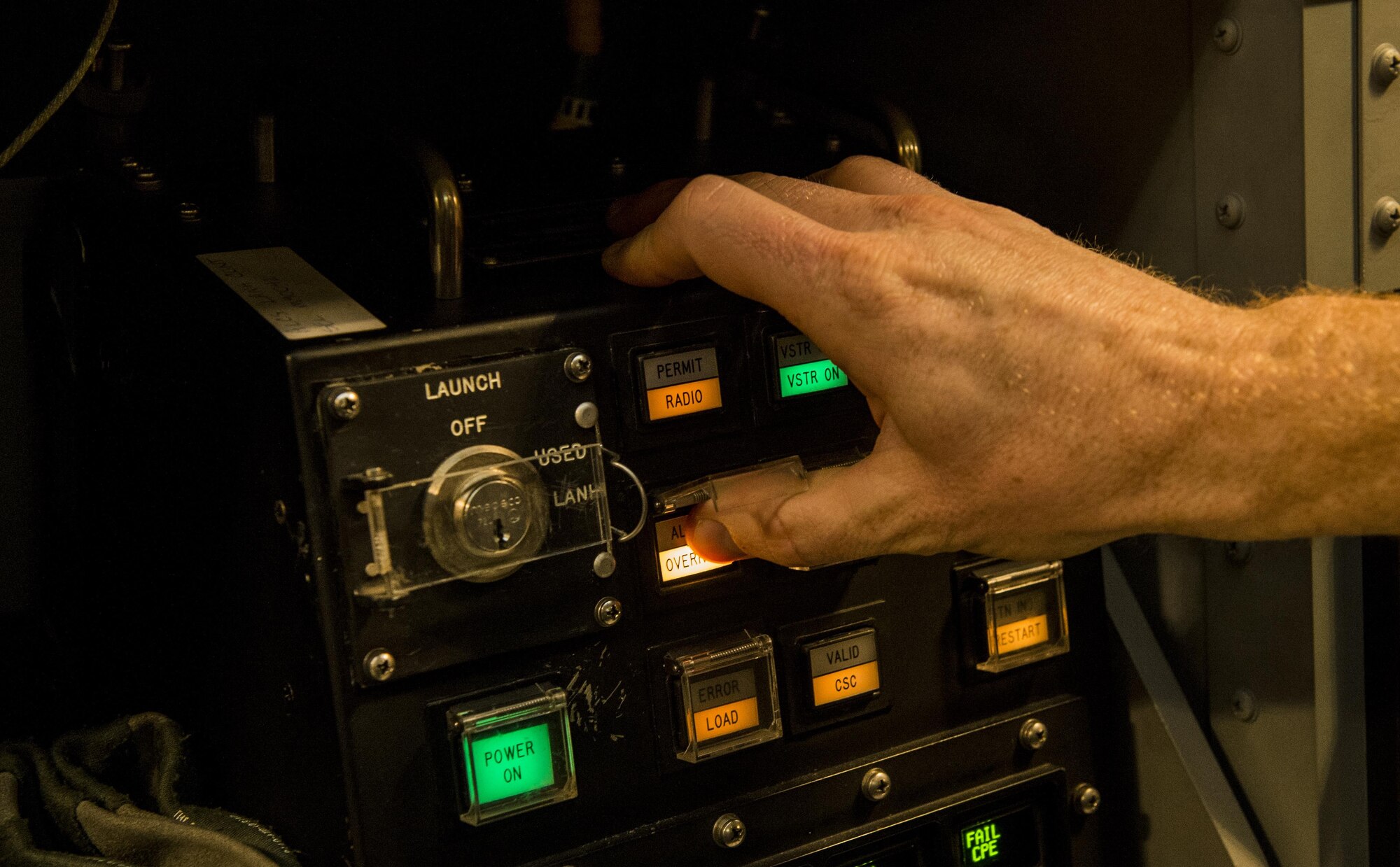 Capt. Greg Carter, a deputy missile combat crew commander-airborne from the 625th Strategic Operations Squadron, goes over pre-launch procedures aboard a U.S. Navy E-6B Mercury during Glory Trip 220 above the Pacific Ocean, April 25, 2017. Glory Trip is an operational test launch which continues a long history of launches from Vandenberg Air Force Base, Calif., used to verify, validate and improve the capability of the nation’s ICBM force. (U.S. Air Force photo by Airman 1st Class Keifer Bowes)