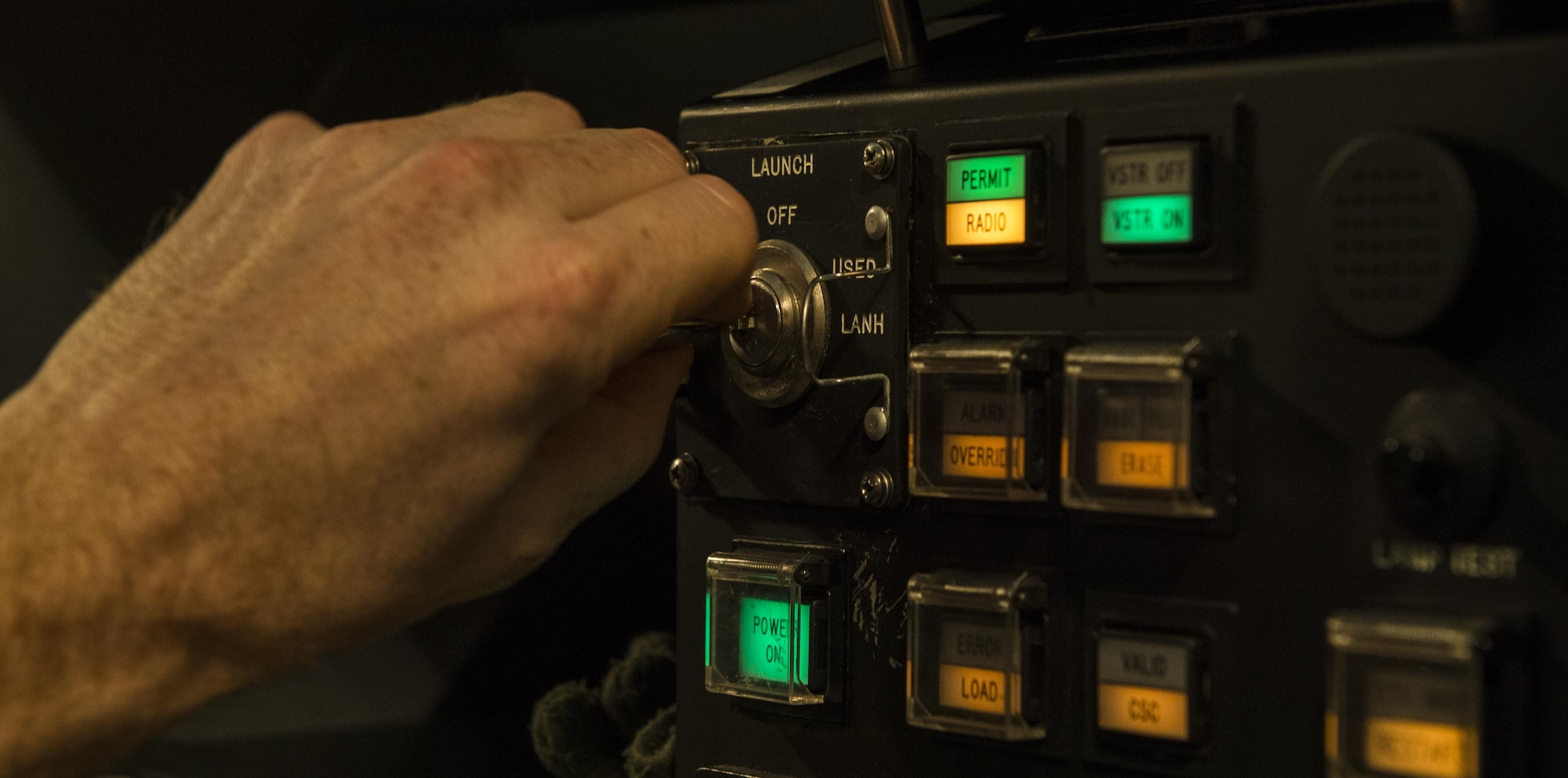 U.S. Air Force Capt. Greg Carter, a deputy missile combat crew commander-airborne from the 625th Strategic Operations Squadron, launches a simulated Minuteman III missile aboard a U.S. Navy E-6B Mercury during Glory Trip 220 above the Pacific Ocean, April 25, 2017. Glory Trip is an operational test launch which continues a long history of launches from Vandenberg Air Force Base, Calif., used to verify, validate and improve the capability of the nation’s ICBM force. (U.S. Air Force photo by Airman 1st Class Keifer Bowes)