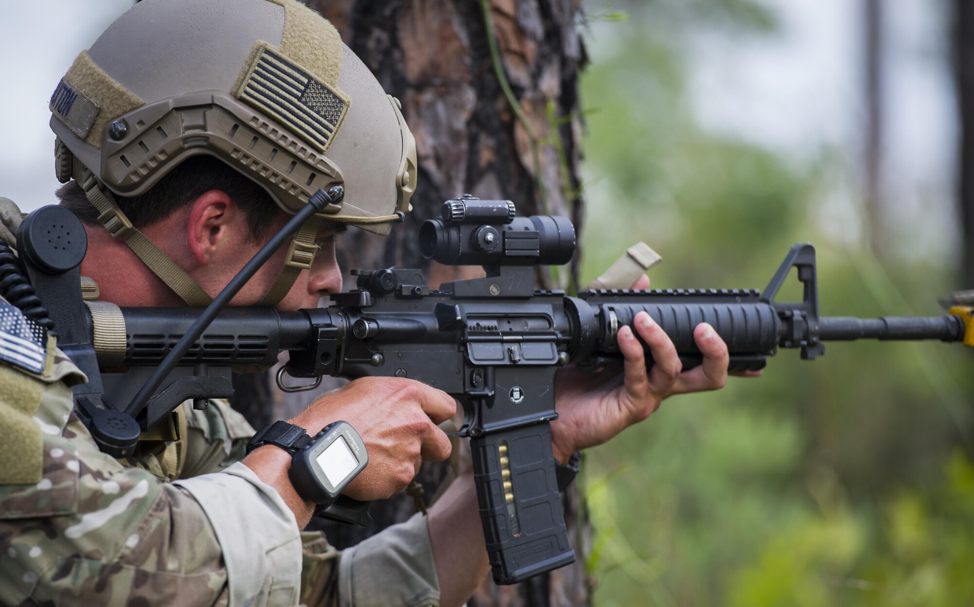 Capt. Nathan Maxton, a combat aviation advisor student with the 6th Special Operations Squadron, returns simulated fire to hostile forces during Operation Raven Claw at Duke Field, Fla., April 27, 2017. Raven Claw is the capstone event for the Air Force Special Operations Training Center’s combat aviation advisor mission qualification course. (U.S. Air Force photo by Airman 1st Class Joseph Pick)