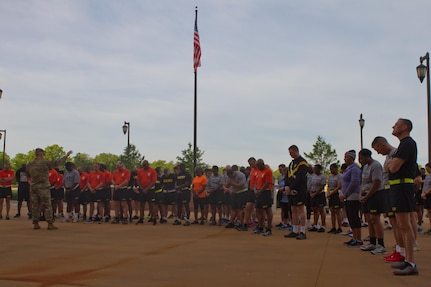 Chaplain (Col.) David Waters, Fort Bragg, N.C., Garrison Chaplain, leads a formation in a time of pray as Soldier, civilians and their families gather outside of Marshall Hall to participate in the National Day of Prayer 2017. Soldiers and civilians set aside time to reflect and prayer for our country during this event. With an emphasis on both spiritual and physical fitness, they ran for approximately 45 minutes, using this time to reflect and pray as well as work on physical fitness. The National Day of Prayer is recognized around the nation on the first Thursday of May every year. It is a time for people around the nation to gather and set aside a time of prayer for the country and its leaders.