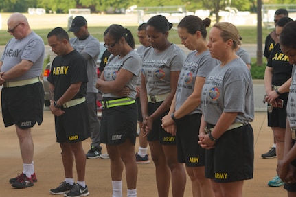 Soldier, civilians and their families gather outside of Marshall Hall at Fort Bragg, N.C., to participate in the National Day of Prayer 2017. Soldiers and civilians set aside time to reflect and pray for our country during this event. With an emphasis on both spiritual and physical fitness, they ran for approximately forty-five minutes, using this time to reflect and pray. The National Day of Prayer is recognized around the nation on the first Thursday of May every year. It is a time for people around the nation to gather and set aside a time of prayer for the country and its leaders.