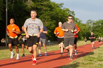 Soldier, civilians and their families gather outside of Marshall Hall at Fort Bragg, N.C., to participate in the National Day of Prayer 2017. Soldiers and civilians set aside time to reflect and pray for our country during this event. With an emphasis on both spiritual and physical fitness, they ran for approximately forty-five minutes, using this time to reflect and pray. The National Day of Prayer is recognized around the nation on the first Thursday of May every year. It is a time for people around the nation to gather and set aside a time of prayer for the country and its leaders.