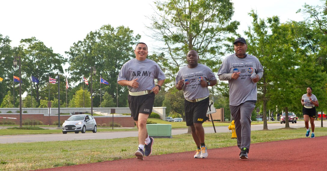 Soldier, civilians and their families gather outside of Marshall Hall at Fort Bragg, N.C., to participate in the National Day of Prayer 2017. Soldiers and civilians set aside time to reflect and pray for our country during this event. With an emphasis on both spiritual and physical fitness, they ran for approximately forty-five minutes, using this time to reflect and pray. The National Day of Prayer is recognized around the nation on the first Thursday of May every year. It is a time for people around the nation to gather and set aside a time of prayer for the country and its leaders.