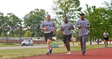 Soldier, civilians and their families gather outside of Marshall Hall at Fort Bragg, N.C., to participate in the National Day of Prayer 2017. Soldiers and civilians set aside time to reflect and pray for our country during this event. With an emphasis on both spiritual and physical fitness, they ran for approximately forty-five minutes, using this time to reflect and pray. The National Day of Prayer is recognized around the nation on the first Thursday of May every year. It is a time for people around the nation to gather and set aside a time of prayer for the country and its leaders.