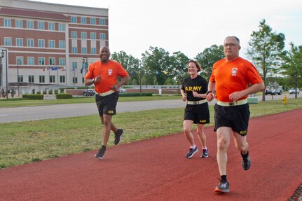 Soldier, civilians and their families gather outside of Marshall Hall at Fort Bragg, N.C., to participate in the National Day of Prayer 2017. Soldiers and civilians set aside time to reflect and pray for our country during this event. With an emphasis on both spiritual and physical fitness, they ran for approximately forty-five minutes, using this time to reflect and pray. The National Day of Prayer is recognized around the nation on the first Thursday of May every year. It is a time for people around the nation to gather and set aside a time of prayer for the country and its leaders.