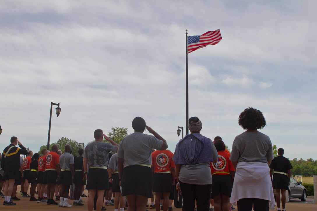 Soldier, civilians and their families gather outside of Marshall Hall at Fort Bragg, N.C., to participate in the National Day of Prayer 2017. Soldiers and civilians set aside time to reflect and pray for our country during this event. With an emphasis on both spiritual and physical fitness, they ran for approximately forty-five minutes, using this time to reflect and pray. The National Day of Prayer is recognized around the nation on the first Thursday of May every year. It is a time for people around the nation to gather and set aside a time of prayer for the country and its leaders.