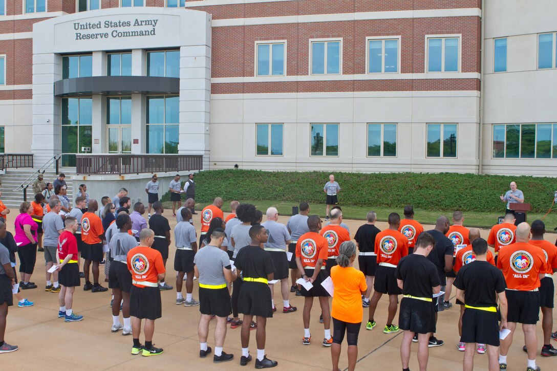 Soldier, civilians and their families gather outside of Marshall Hall at Fort Bragg, N.C., to participate in the National Day of Prayer 2017. Soldiers and civilians set aside time to reflect and pray for our country during this event. With an emphasis on both spiritual and physical fitness, they ran for approximately forty-five minutes, using this time to reflect and pray. The National Day of Prayer is recognized around the nation on the first Thursday of May every year. It is a time for people around the nation to gather and set aside a time of prayer for the country and its leaders.