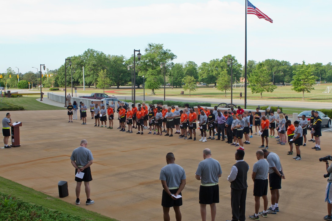 Soldier, civilians and their families gather outside of Marshall Hall at Fort Bragg, N.C.,  to participate in the National Day of Prayer 2017. Soldiers and civilians set aside time to reflect and pray for our country during this event. With an emphasis on both spiritual and physical fitness, they ran for approximately forty-five minutes, using this time to reflect and pray as well as work on physical fitness. The National Day of Prayer is recognized around the nation on the first Thursday of May every year. It is a time for people around the nation to gather and set aside a time of prayer for the country and its leaders.