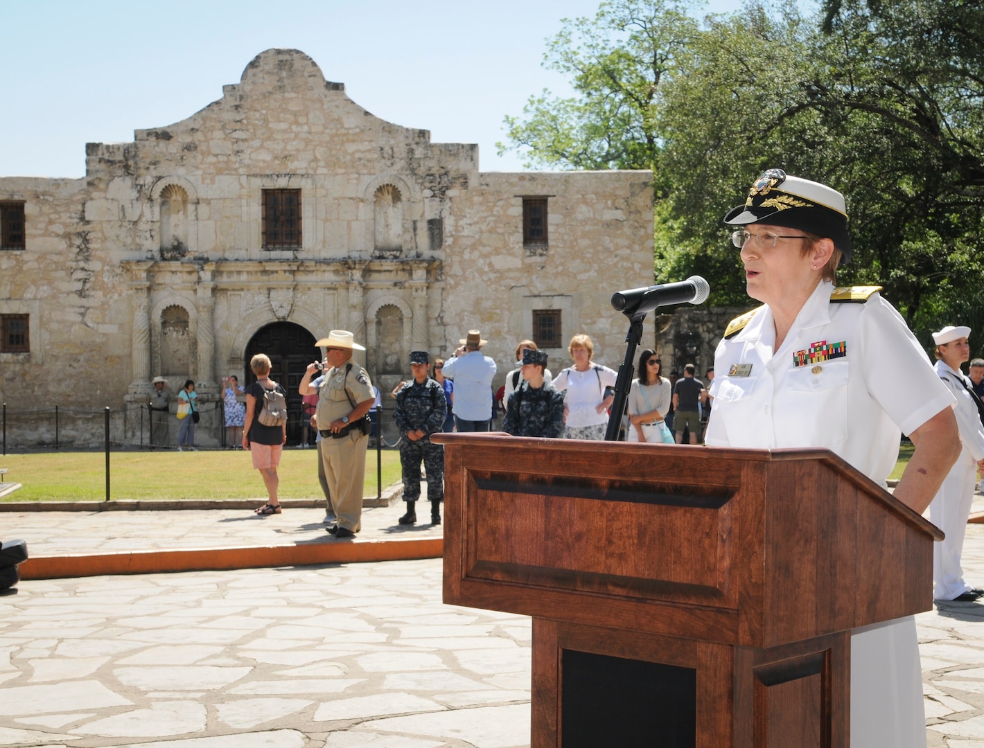 Rear Adm. Rebecca McCormick-Boyle, commander, Navy Medicine Education, Training and Logistics Command, speaks during Navy Day at the Alamo as part of Fiesta in downtown San Antonio. McCormick-Boyle attended as the host and senior Navy officer in the San Antonio area and was joined by several other area commands.