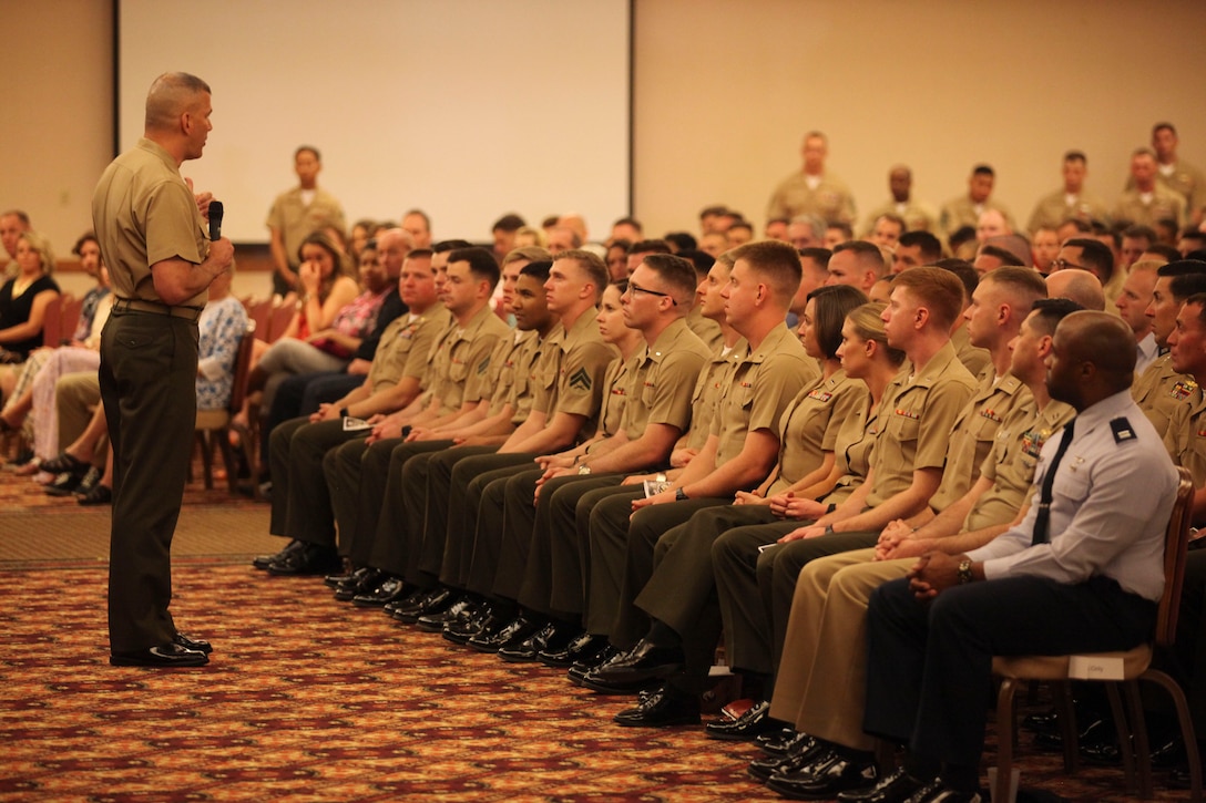 Brig. General William Mullen III speaks to the recent graduates of the Weapons and Tactics Instructor Course 2-17 at Marine Corps Air Station Yuma, Ariz., April 30, 2017. WTI is a seven week period of instruction that teaches advanced air and ground tactics in order to produce certified Weapons and Tactics Instructors. More than 200 Marines and Sailors graduated from this class of WTI. Mullen is the commanding general of Marine Air Ground Task Force Training Command, Marine Corps Air Ground Combat Center. (U.S. Marine Corps photo by Lance Cpl. Cody Lemons/Released)