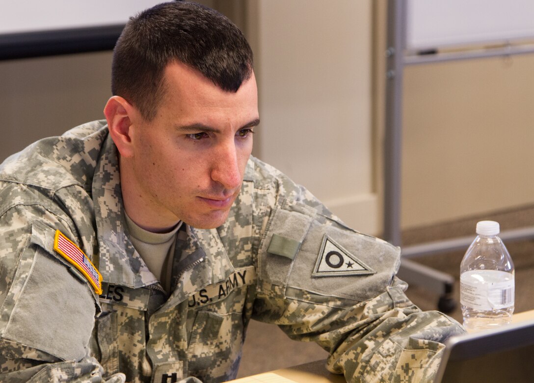 Capt. Nicholas Oles, an Exercise Cyber Shield 17 team leader from the Ohio Army National Guard out of Columbus, Ohio, surveys statistical progress of training on his computer as part of the Cyber Shield 17 multi-service training exercise conducted at Camp Williams, Utah, on May 2, 2017. Exercise Cyber Shield 17 is the sixth iteration of this training exercise and this year unites the Army National Guard with members of the Air National Guard, Army Reserve, and civilians from private companies, state government agencies, federal agencies, industry partners, and academia. (U.S. Army Reserve photo by Spc. Christopher Hernandez)