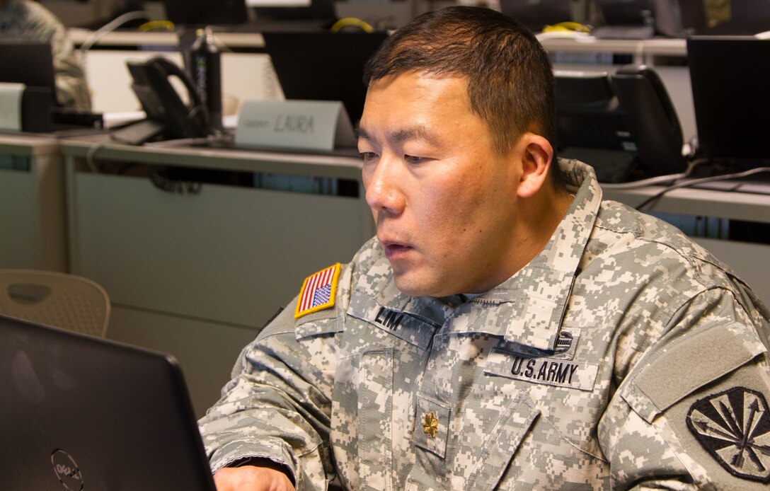 Maj. Hyung Lim, an information systems management officer and training analyst with the Joint Forces Headquarters/Defensive Cyber Operations Element and the Arizona Army National Guard out of Phoenix, Ariz., analyzes data streamed from the progress of the cyber teams as part of the Exercise Cyber Shield 17 multi-service training exercise conducted at Camp Williams, Utah, on May 2, 2017. Exercise Cyber Shield 17 is the sixth iteration of this training exercise and this year unites the Army National Guard with members of the Air National Guard, Army Reserve, and civilians from private companies, state government agencies, federal agencies, industry partners, and academia. (U.S. Army Reserve photo by Spc. Christopher Hernandez)