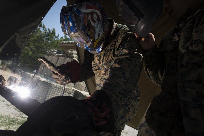 CAMP LEJEUNE, N.C. – Lance Cpl. Marcus X. Patino, a landing support specialist with the Logistics Combat Element, Special Purpose Marine Air-Ground Task Force - Southern Command, practices welding during General Exercise 2 at Marine Corps Base Camp Lejeune, North Carolina, April 28, 2017. During the exercise, the Marines simulated construction of a schoolhouse in preparation for infrastructure improvement projects scheduled during their upcoming deployment to Central America. (U.S. Marine Corps photo by Sgt. Ian Leones)