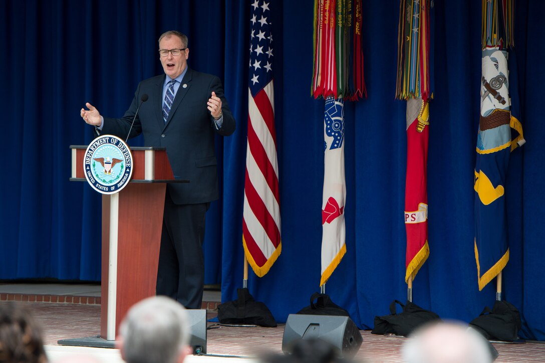 Deputy Defense Secretary Bob Work addresses an audience in the Pentagon’s center courtyard at DoD’s annual Spirit of Service awards ceremony as part of Public Service Recognition Week, May 4, 2017. During the ceremony, the deputy greeted each of the two dozen award recipients, who represented DoD and the service branches in the National Capital Area, and gave each a challenge coin. DoD photo by Air Force Staff Sgt. Jette Carr