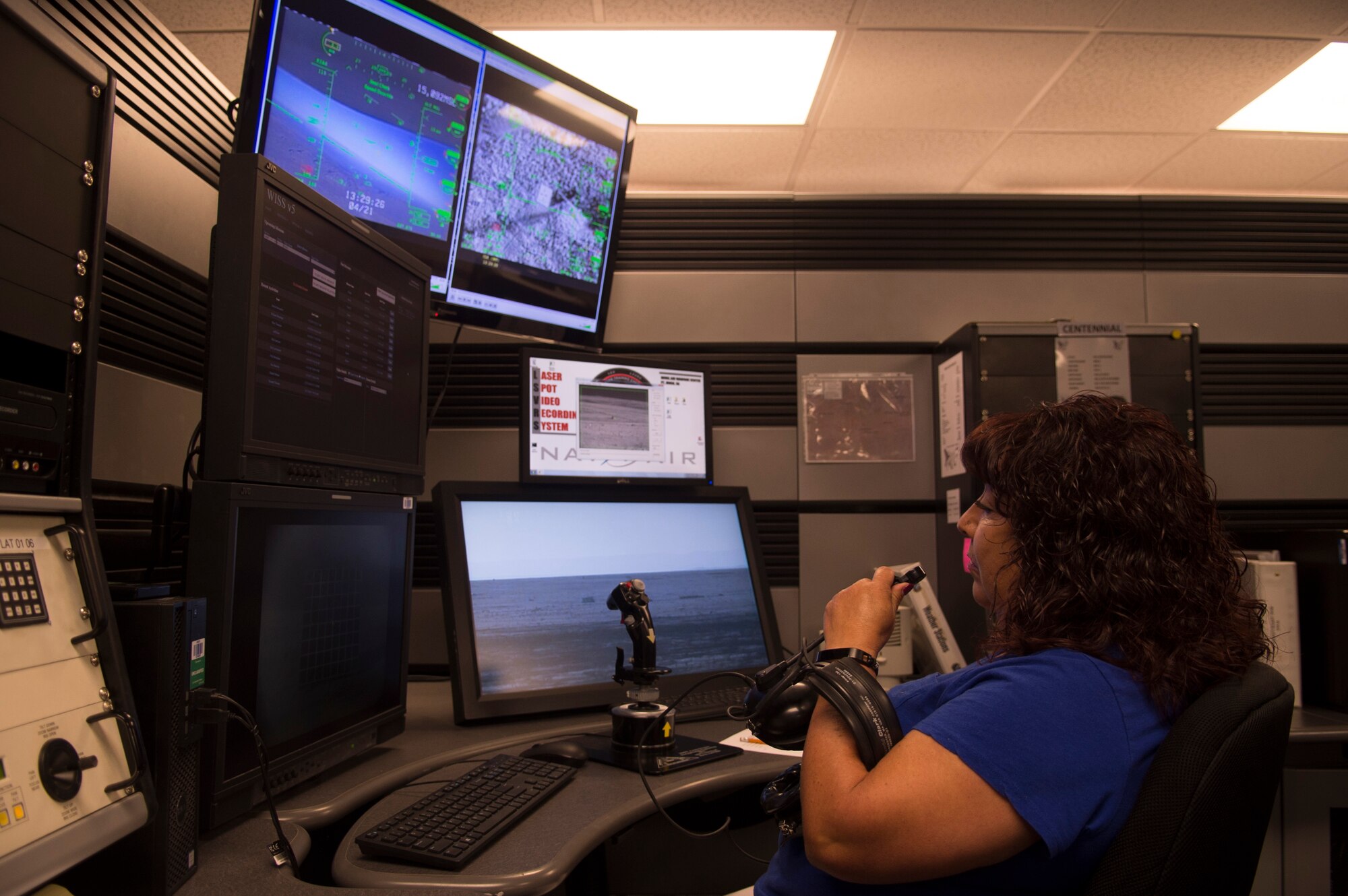 Sarah Hernandez, a 49th Operations Support Squadron range operations center operator, checks the laser board systems on April 21, 2017 at Holloman Air Force Base, N.M. The ROC operators assist student pilots with dropping bombs on target and scoring how close the ordnance impacted the intended target. (U.S. Air Force photo by Tech. Sgt. Amanda Junk)