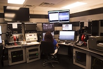 Sarah Hernandez, a 49th Operations Support Squadron range operations center operator, checks the laser board systems on April 21, 2017 at Holloman Air Force Base, N.M. The ROC operators assist student pilots with dropping bombs on target and scoring how close the ordnance impacted the intended target. (U.S. Air Force photo by Tech. Sgt. Amanda Junk)
