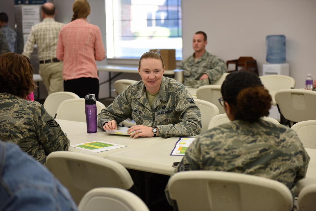 Goodfellow enlisted service members converse before the Caring for People Forum at Taylor Chapel on Goodfellow Air Force Base, Texas, May 4, 2017. The Caring for People Forum is an Air Force initiative for base improvement based off of member’s requests. (U.S. Air Force photo by Airman 1st Class Caelynn Ferguson/ Released)