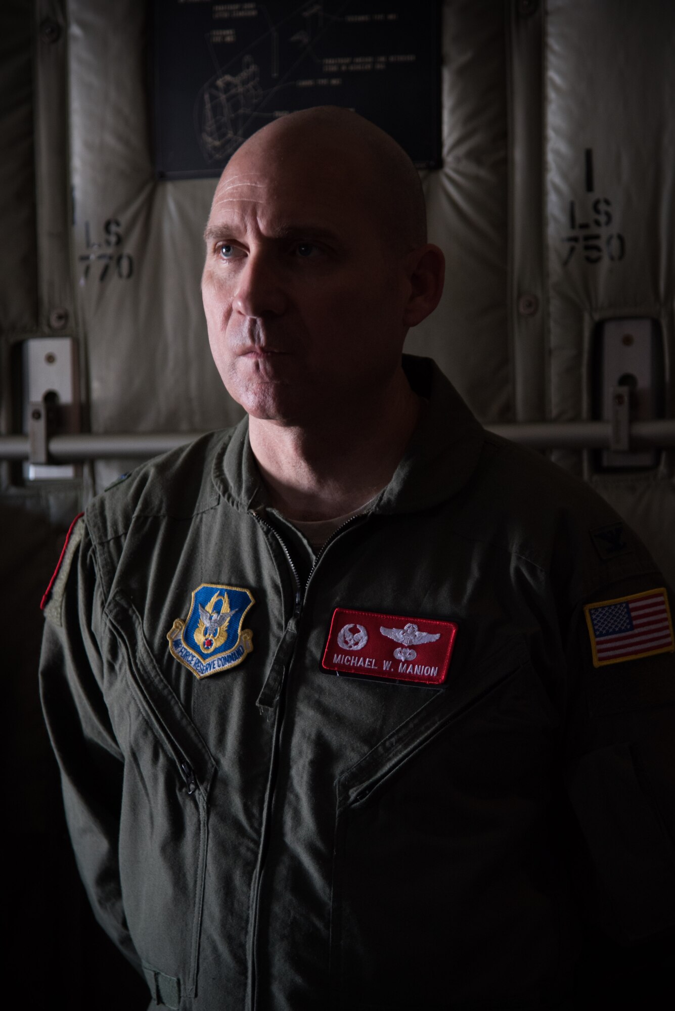 Col. Michael Manion, 403rd Wing commander listens to a mission briefing on a C-130J Super Hercules aircraft during the final flight of his Air Force career May 4, 2017 at Keesler Air Force Base, Mississippi.(U.S. Air Force photo/Staff Sgt. Heather Heiney)