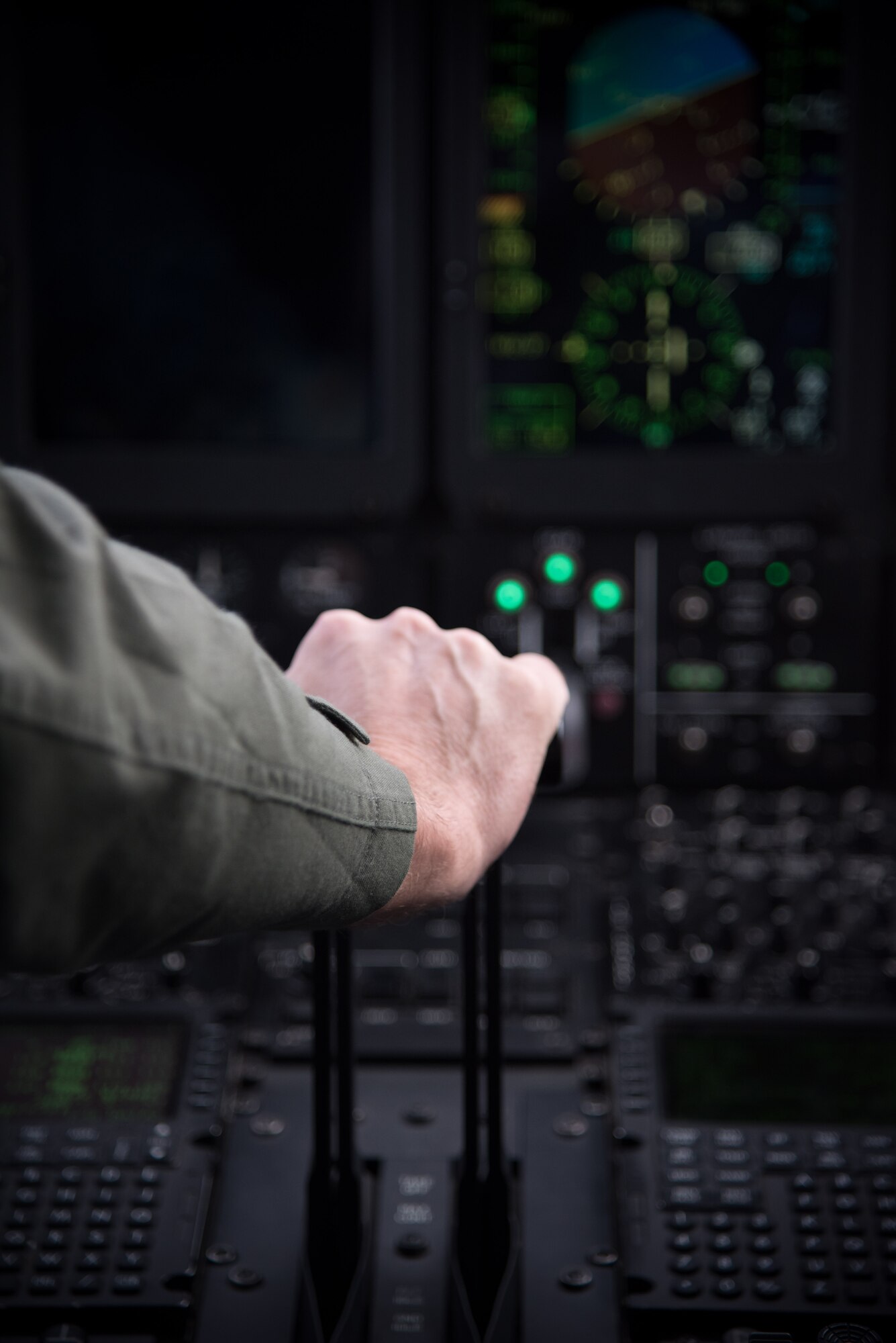 Col. Michael Manion, 403rd Wing commander pulls back on the throttle of a C-130J Super Hercules aircraft during the final flight of his Air Force career May 4, 2017 at Keesler Air Force Base, Mississippi.(U.S. Air Force photo/Staff Sgt. Heather Heiney)