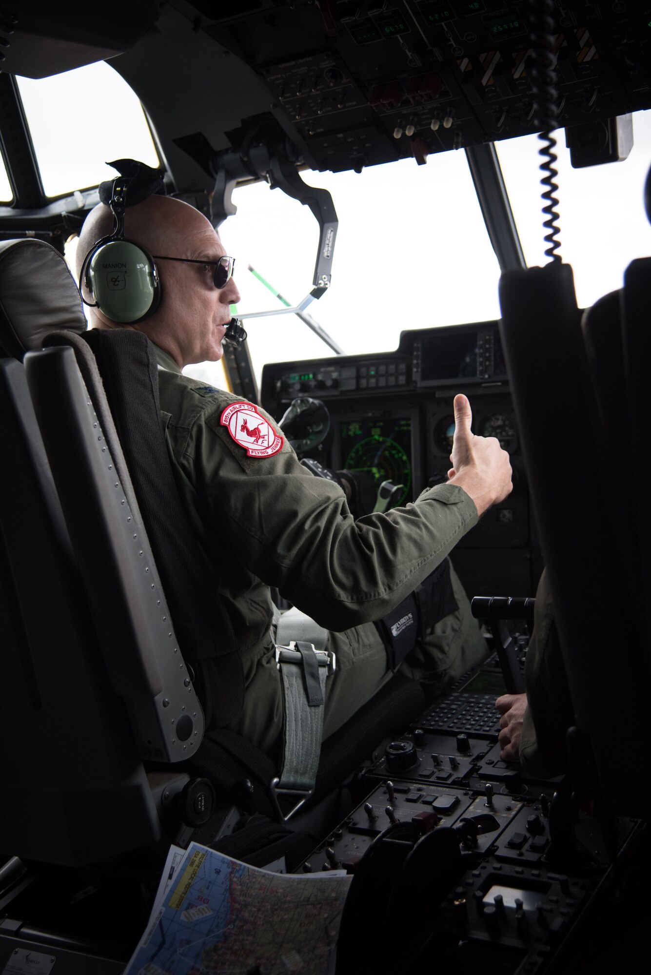 Col. Michael Manion, 403rd Wing commander gives the thumbs up on a C-130J Super Hercules aircraft during the final flight of his Air Force career May 4, 2017 at Keesler Air Force Base, Mississippi.(U.S. Air Force photo/Staff Sgt. Heather Heiney)