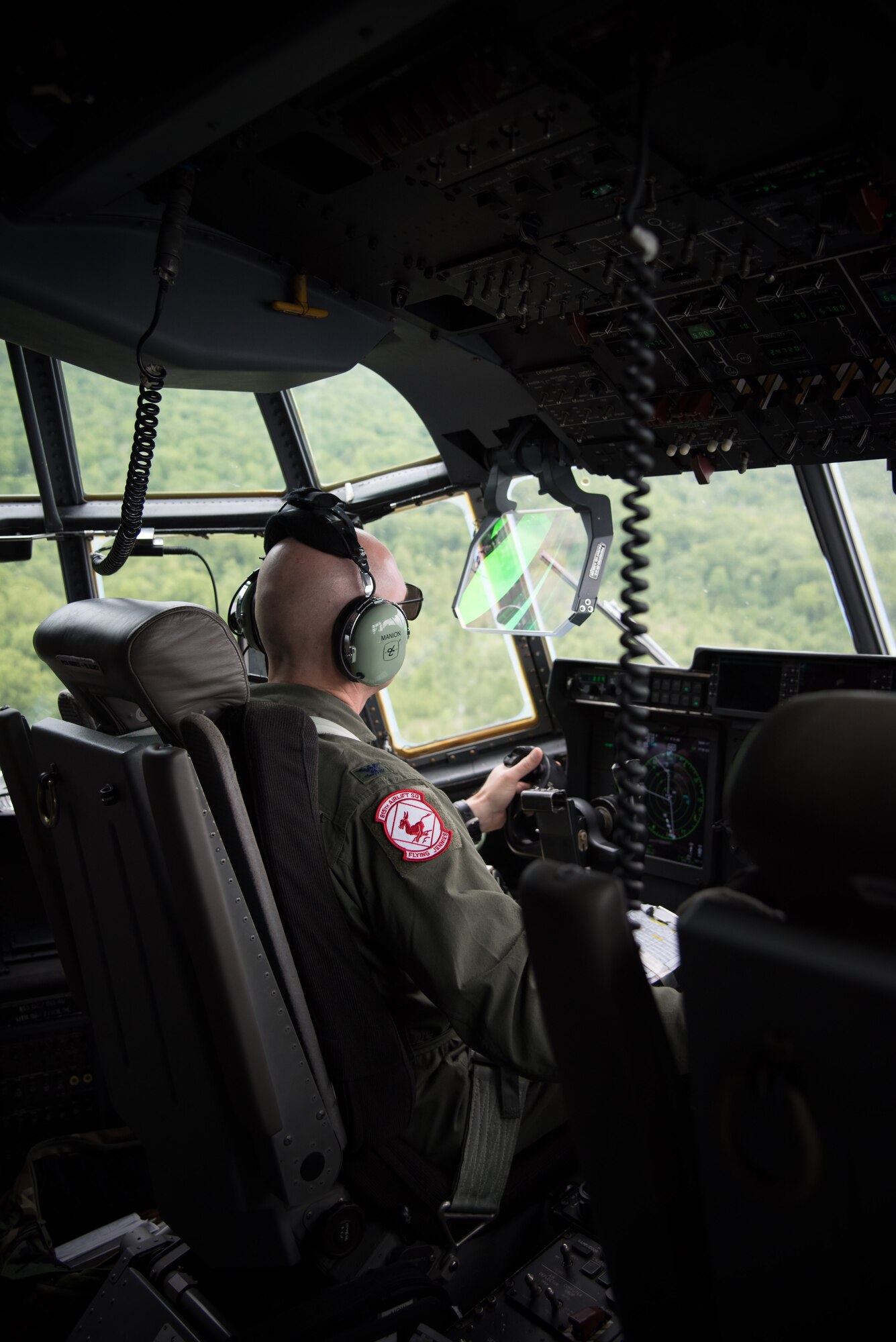 Col. Michael Manion, 403rd Wing commander, practices tactical manuvers on a C-130J Super Hercules aircraft during the final flight of his Air Force career May 4, 2017 at Keesler Air Force Base, Mississippi.(U.S. Air Force photo/Staff Sgt. Heather Heiney)