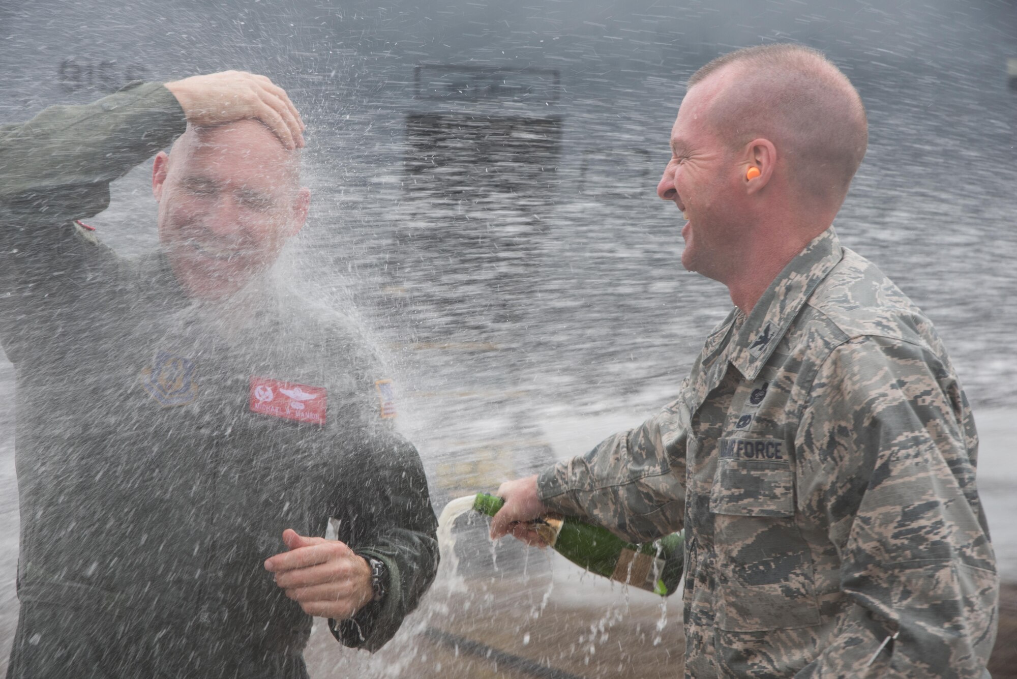 Col. Michael W. Manion, 403rd Wing commander, is sprayed with water after his final flight on a C-130J Super Hercules at Keesler Air Force Base, Mississippi, May 4, 2017. (U.S. Air Force photo/Maj. Marnee A.C. Losurdo)