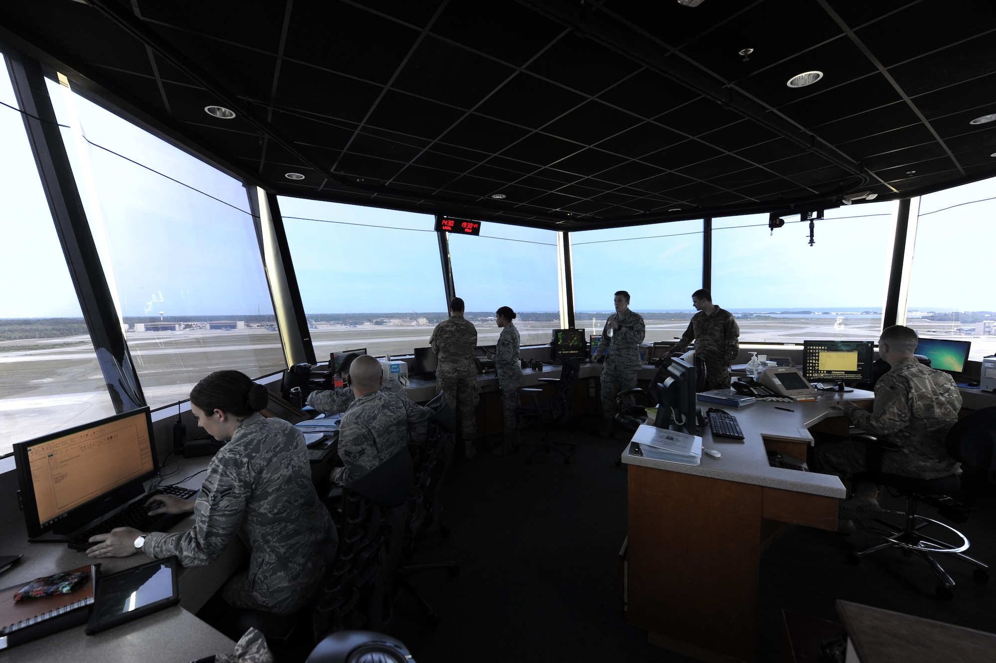 Air traffic controllers monitor incoming and scheduled aircraft at Hurlburt Field, Fla., May 3, 2017. Air traffic controllers provide safe and organized flow of aircraft on the flight line and in the air by monitoring and keeping track of scheduled incoming and departing aircraft .(U.S. Air Force photo by Airman 1st Class Isaac O. Guest IV)
