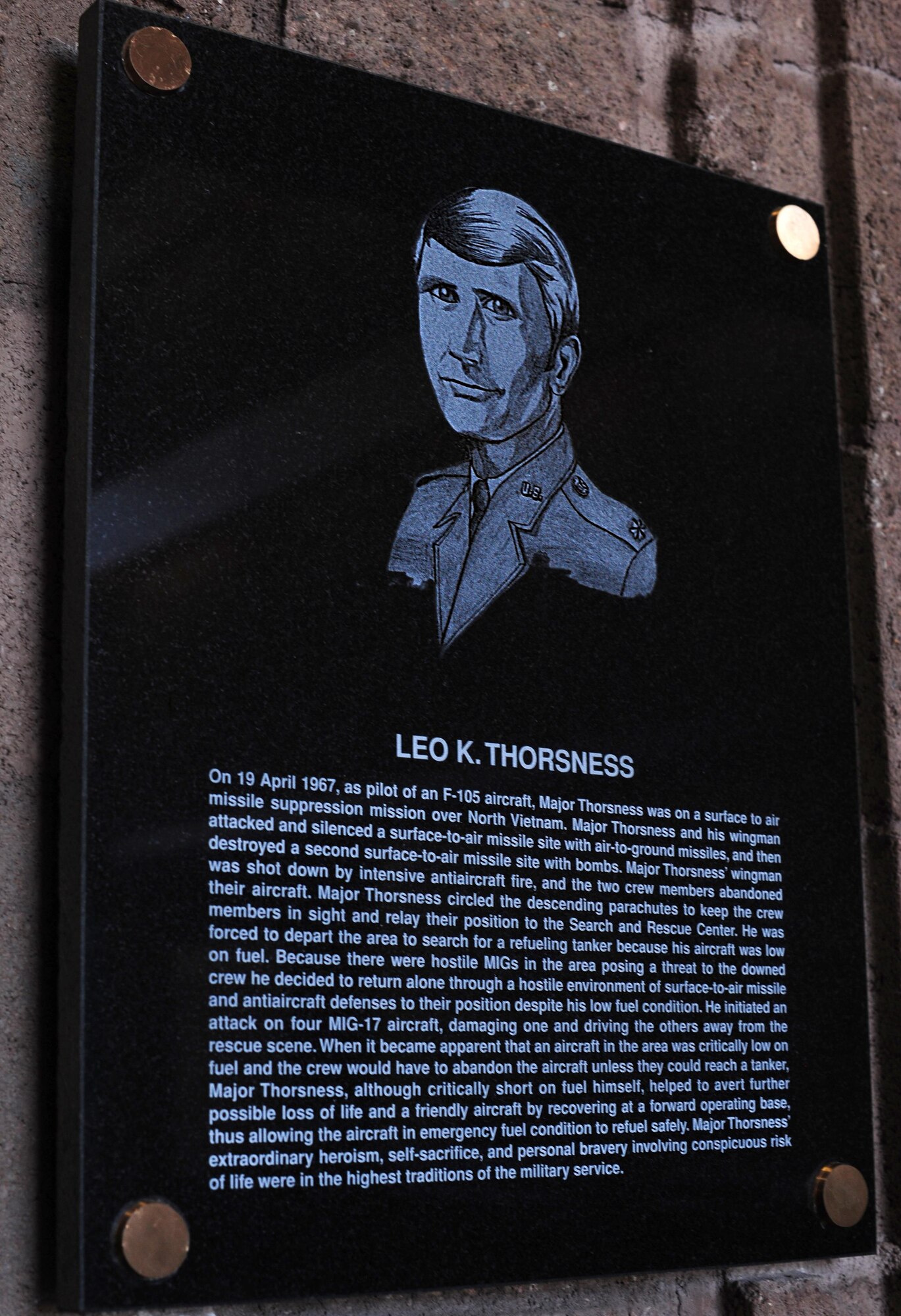A plaque is dedicated to retired Air Force Lt. Col. Leo K. Thorsness in the 355th Fighter Wing headquarters building, named Leo K. Thorsness Hall, at Davis-Monthan Air Force Base, Ariz., May 4, 2017. Thorsness, one of 14 Vietnam-era Air Force members to receive the Medal of Honor, died May 2 in Jacksonville, Fla., at the age of 85.