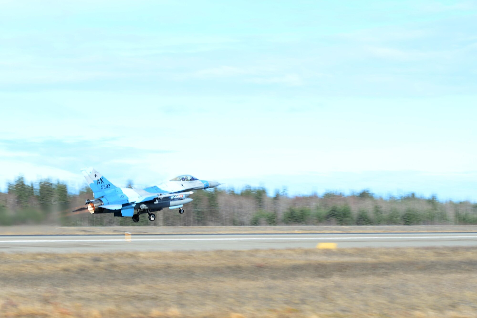 EIELSON AIR FORCE BASE, Alaska – A U.S. Air Force F-16 Fighting Falcon aircraft assigned to the 18th Aggressor Squadron takes off for a sortie from Eielson Air Force Base, Alaska, May 4, 2017 during NORTHERN EDGE 2017 (NE17). NE17 is Alaska’s premier joint training exercise designed to practice operations, techniques and procedures as well as enhance interoperability among the services. Thousands of participants from all the services, Airmen, Soldiers, Sailors, Marines and Coast Guardsmen from active duty, Reserve and National Guard units are involved. (U.S. Air Force photo by Airman Eric M. Fisher)