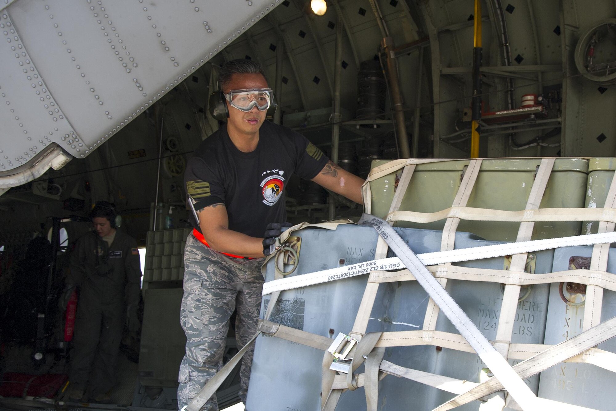 Reserve Citizen Airman Tech. Sgt. Eric Ignacio, of Honolulu, Hawaii, an aerial transportation specialist with the 48th Aerial Port Squadron, guides a pallet of equipment onto the C-130 H during the Port Dawg Challenge at Dobbins Air Reserve Base, Ga., April 25, 2017.  The 48th APS, based out of Joint Base Pearl Harbor-Hickam, Hawaii, was one of 23 teams competing in the 4th biennial Air Force Reserve Command's Port Dawg Challenge, which was designed to test and maintain the camaraderie of aerial port Airmen while promoting professionalism, leadership, training and communication between "Port Dawgs." The 48th APS is a component of the Air Force Reserve, providing expertise in all areas of air terminal operations to include aircraft loading, cargo processing and inspecting, passenger services, aircraft fleet services and aerial port command and control. (U.S. Air Force photo by Master Sgt. Theanne K. Herrmann)