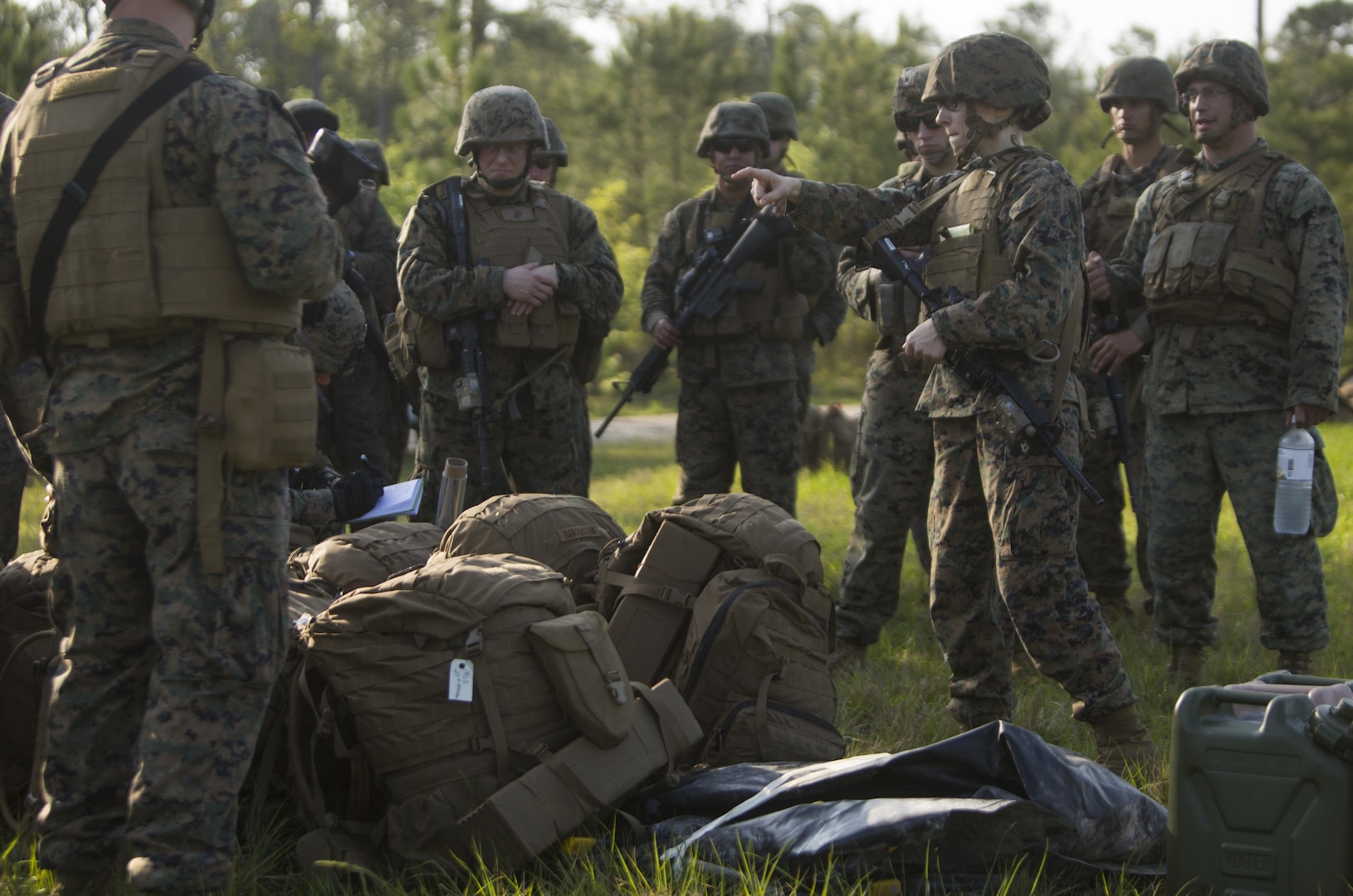 CAMP LEJEUNE, N.C. – Capt. Phoebe D. Riner, the staff judge advocate with the Command Element, Special Purpose Marine Air-Ground Task Force - Southern Command, explains the rules of engagement to Marines and sailors during General Exercise 2 at Marine Corps Base Camp Lejeune, North Carolina, April 29, 2017. The Marines simulated a noncombatant evacuation operation in order to prepare for crisis response situations they could face during their deployment to Central America. (U.S. Marine Corps photo by Sgt. Ian Leones)