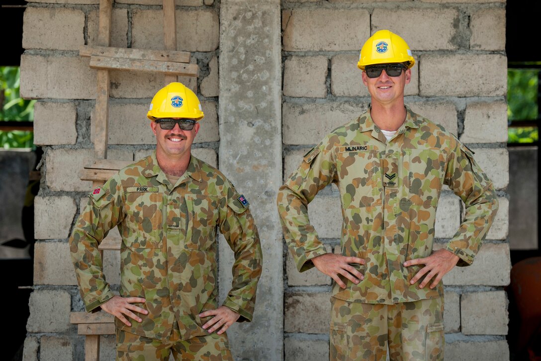 Australian Army Spr. Joshua Park, left, and Cpl. Steven Mlinaric pose for a photo during Balikatan 2017 in Ormoc City, Leyte, April 29, 2017. Australian Soldiers, U.S. service members, and the Armed Forces of the Philippines worked together to build new classrooms at Margen Elementary School in Ormoc City. Balikatan is an annual U.S.-Philippine bilateral military exercise focused on a variety of missions, including humanitarian assistance and disaster relief, counterterrorism and other combined military operations. 