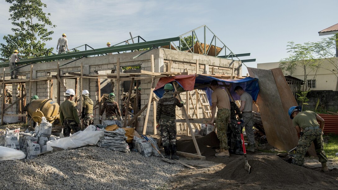 U.S. military, Australian Soldiers, and the Armed Forces of the Philippines prepare a structure for concrete work during Balikatan 2017 in Ormoc City, Leyte, April 29, 2017. Engineers from the three nations worked together to build new classrooms at Margen Elementary School in Ormoc City. Balikatan is an annual U.S.-Philippine military bilateral exercise focused on a variety of missions, including humanitarian assistance and disaster relief, counterterrorism, and other combined military operations. 