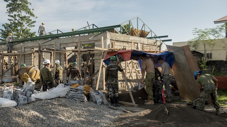U.S. military, Australian Soldiers, and the Armed Forces of the Philippines prepare a structure for concrete work during Balikatan 2017 in Ormoc City, Leyte, April 29, 2017. Engineers from the three nations worked together to build new classrooms at Margen Elementary School in Ormoc City. Balikatan is an annual U.S.-Philippine military bilateral exercise focused on a variety of missions, including humanitarian assistance and disaster relief, counterterrorism, and other combined military operations. 