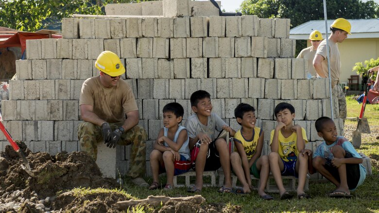 Australian Army Spr. Joshua Park takes a break from construction to spend time with Filipino children during Balikatan 2017 in Ormoc City, Leyte, April 29, 2017. Australian Soldiers and U.S. service members worked together with the Armed Forces of the Philippines to build new classrooms at Margen Elementary School in Ormoc City. Balikatan is an annual U.S.-Philippine bilateral military exercise focused on a variety of missions, including humanitarian assistance and disaster relief, counterterrorism and other combined military operations. 