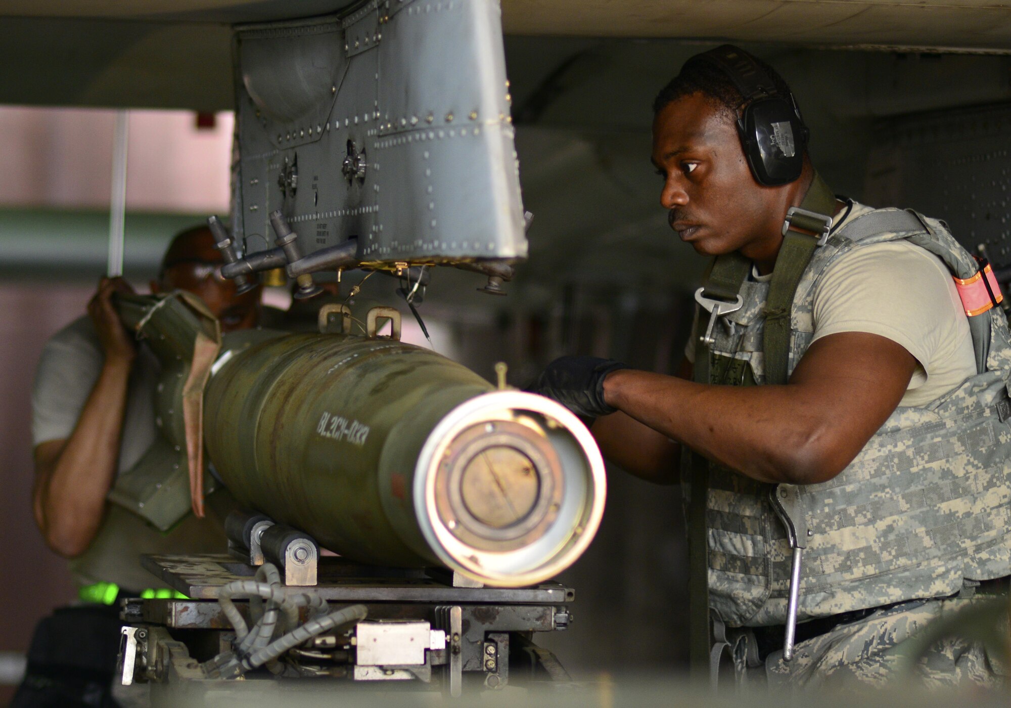 U.S. Air Force Staff Sgt. Terry White, 51st Maintenance Group weapons crew team member, secures munitions on an A-10 Thunderbolt II during Exercise Beverly Herd 17-2 at Osan Air Base, Republic of Korea, May 4, 2017. The no-notice exercise challenged the tradition of planning exercises weeks or months in advance, allowing wing leadership a view of how personnel would respond in real-world situations. (U.S. Air Force photo by Staff Sgt. Alex Fox Echols III)