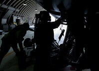 U.S. Air force Staff Sgt. David Bridges 51st Aircraft Maintenance Squadron weapons load crew chief, load ammunition onto an A-10 Thunderbolt during exercise Beverly Herd 17-2 at Osan Air Base, Republic of Korea, May 5, 2017. The no-notice exercise challenged the tradition of planning exercises weeks or months in advance, allowing wing leadership a view of how personnel would react in a real-world situation. (U.S. Air Force photo by Airman 1st Class Gwendalyn Smith)