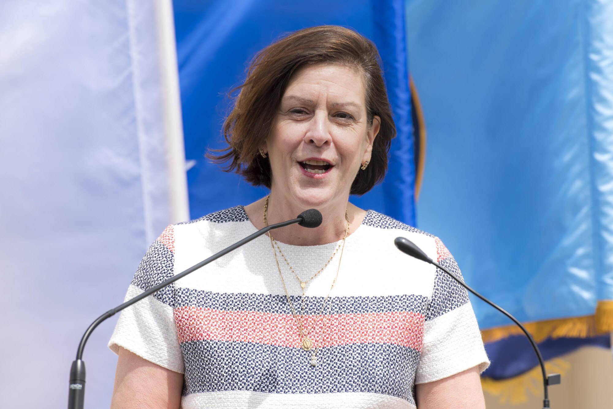 Teresa McKay, Defense Finance and Accounting Service director, gives a speech during the ribbon cutting ceremony of the new facility for the 374th Security Forces Squadron and DFAS Japan at Yokota Air Base, Japan, May 3, 2017. DFAS Japan previously occupied two buildings. However, due to a fire employees were relocated to another building in 2009. Now, DFAS Japan is brought together under one roof. (U.S. Air Force photo by Machiko Arita)
