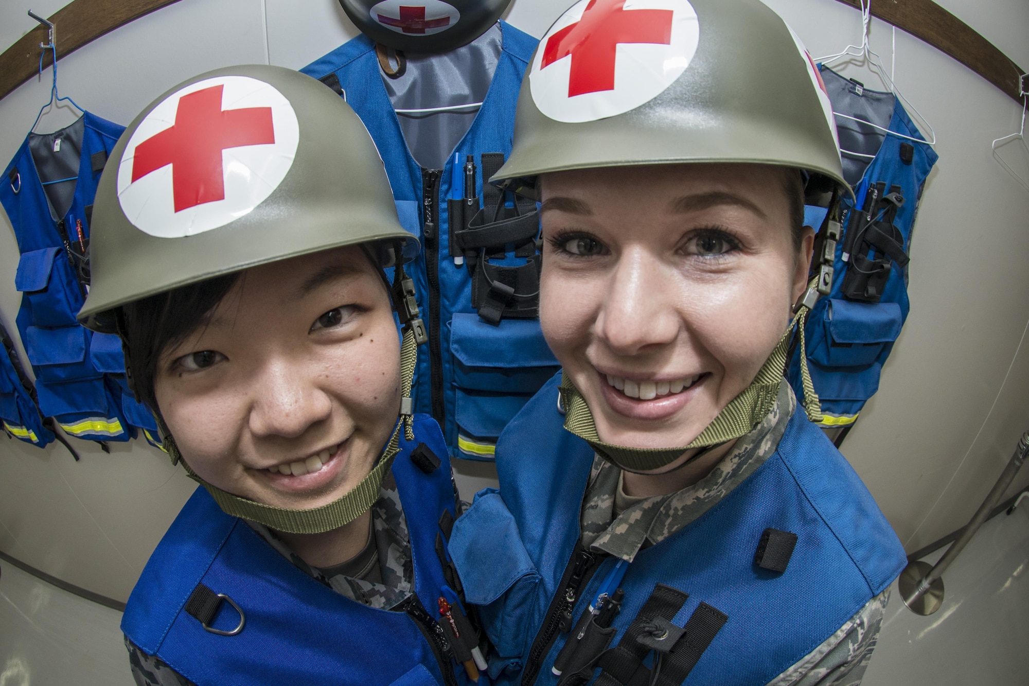 Koku-Jieitai Senior Airman Minori Utano, left, a 2nd Air Wing Medical Squadron medical administration technician, poses for a photo with her counterpart, U.S. Air Force Tech. Sgt. Jessica Nienheuser, right, the 35th Medical Support Squadron patient administration section chief, during a 10-day U.S.-Japan Bilateral Career Training at Chitose Air Base, Japan, April 19, 2017. Nienheuser joined nine other U.S. Airmen, April 11-20, for the bilateral exchange event that brought the two nations closer as allies and friends. The technical sergeant said she learned a lot from the Japanese saying she was specifically impressed by how their senior leaders work right along with their Airmen. “I can see they lead by example and I can take that as a strength because it works for them, because their subordinates respect them,” she said. Koku-Jieitai is the traditional term for Japan Air Self Defense Force used by the Japanese. (U.S. Air Force photo by Tech. Sgt. Benjamin W. Stratton)