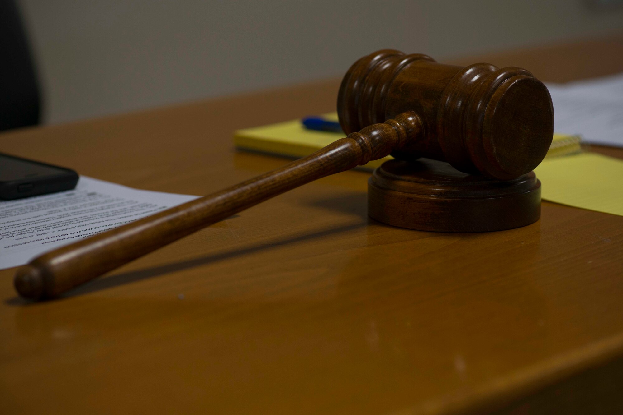 The Military Judge’s gavel lays on a table during a Sexual Assault Awareness and Prevention Month (SAAPM) mock trial April 27, 2017, at Incirlik Air Base, Turkey. The gavel was used during Incirlik’s first SAAPM mock trial, which was organized by the 39th ABW Legal Office and Sexual Assault Response Coordinator to inform Airmen on the legal process of a sexual assault case.. (U.S. Air Force photo by Airman 1st Class Devin M. Rumbaugh)